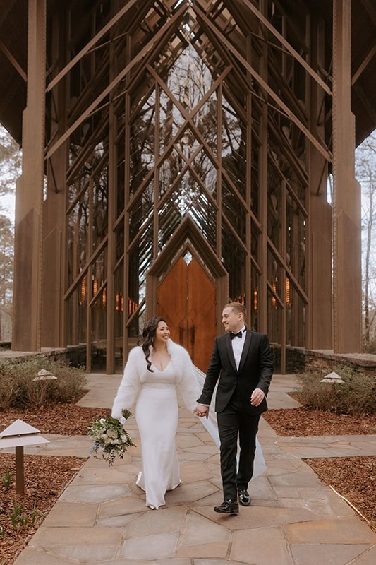 A couple just got married as they are seen leaving Anthony Chapel at Garvan Woodland Gardens in Hot Springs, Arkansas.